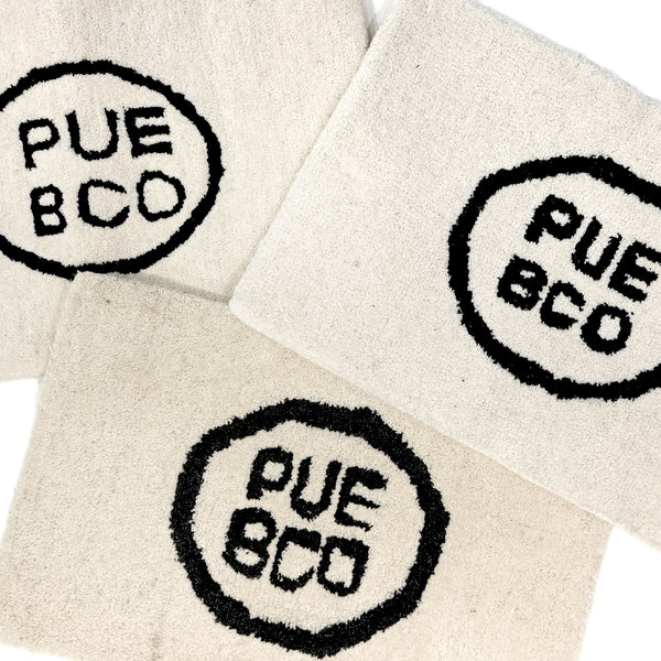 TUFTED MAT / PUEBCO LOGO