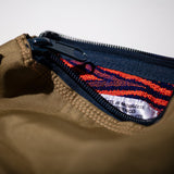 RUBBERIZED HOOD FABRIC x JACQUARD POUCH